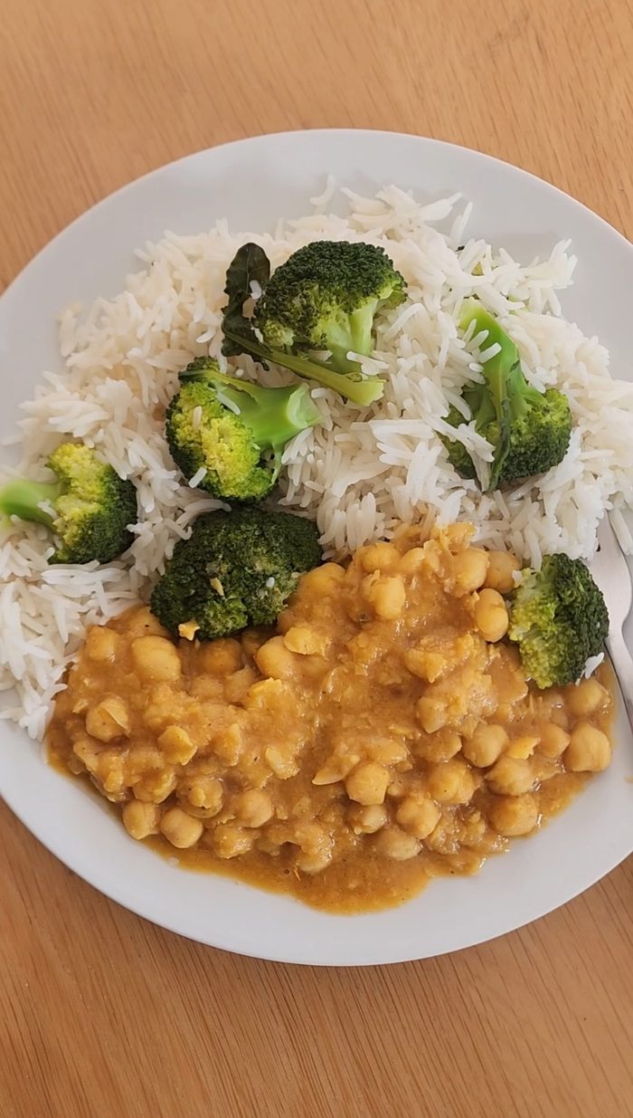 Chana Masala served with rice and broccoli